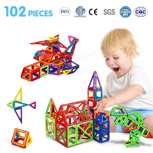 A Kid is playing with toys made by magnetic blocks